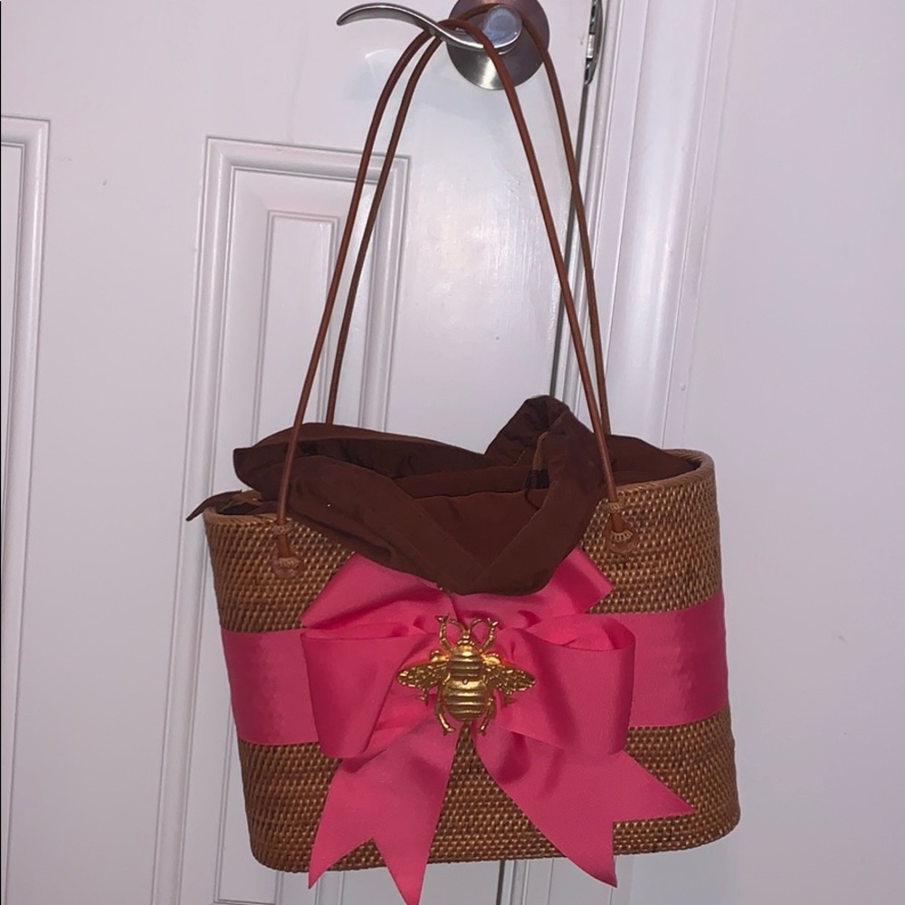 Pink straw tote bag w/ bee on front